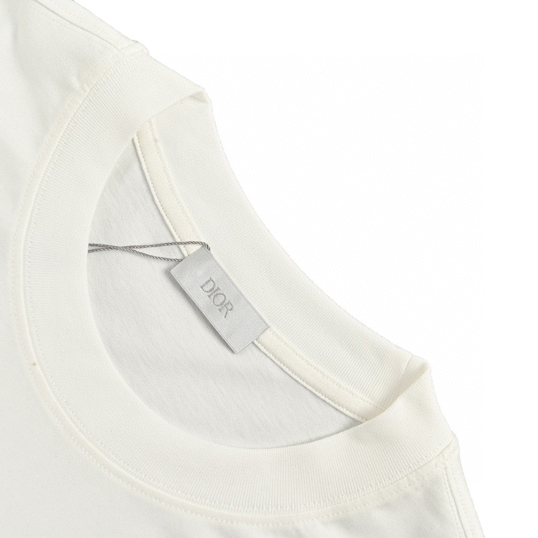 Dior And Brown T-shirt - White Unisex Streetwear Limited Edition - This Dior t-shirt features a bold graphic design with 'Dior' text prominently displayed. The white