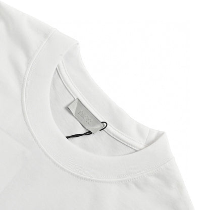 Dior Christian Dior Graphic T-shirt - White Unisex Streetwear Limited Edition - This Dior t-shirt features a bold graphic design with 'Christian Dior' text and star-like elements.