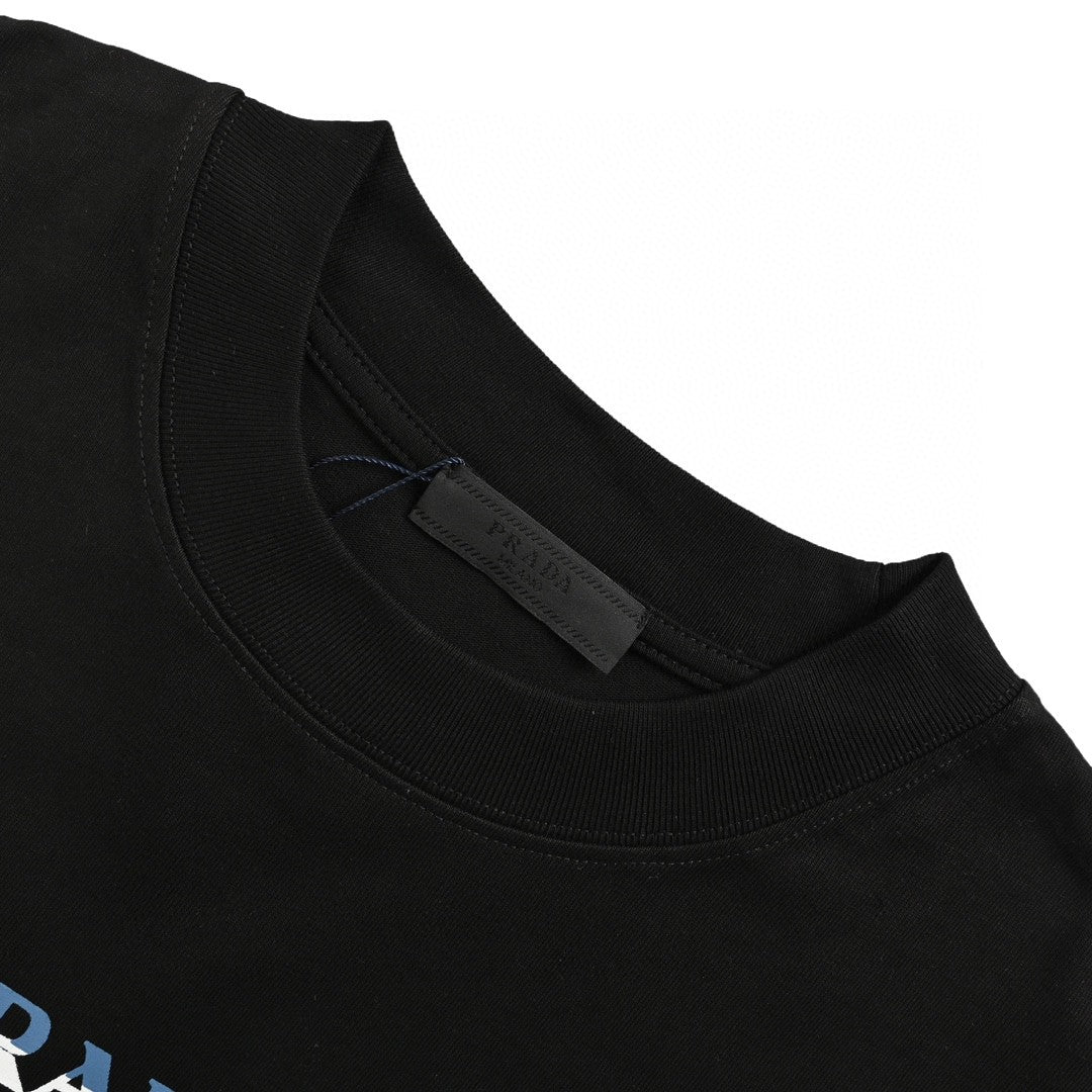 Prada T-shirt With Logo Design - Black Unisex Streetwear Limited Edition - The Prada Black T-Shirt with Logo Design is a sleek and modern piece that embodies