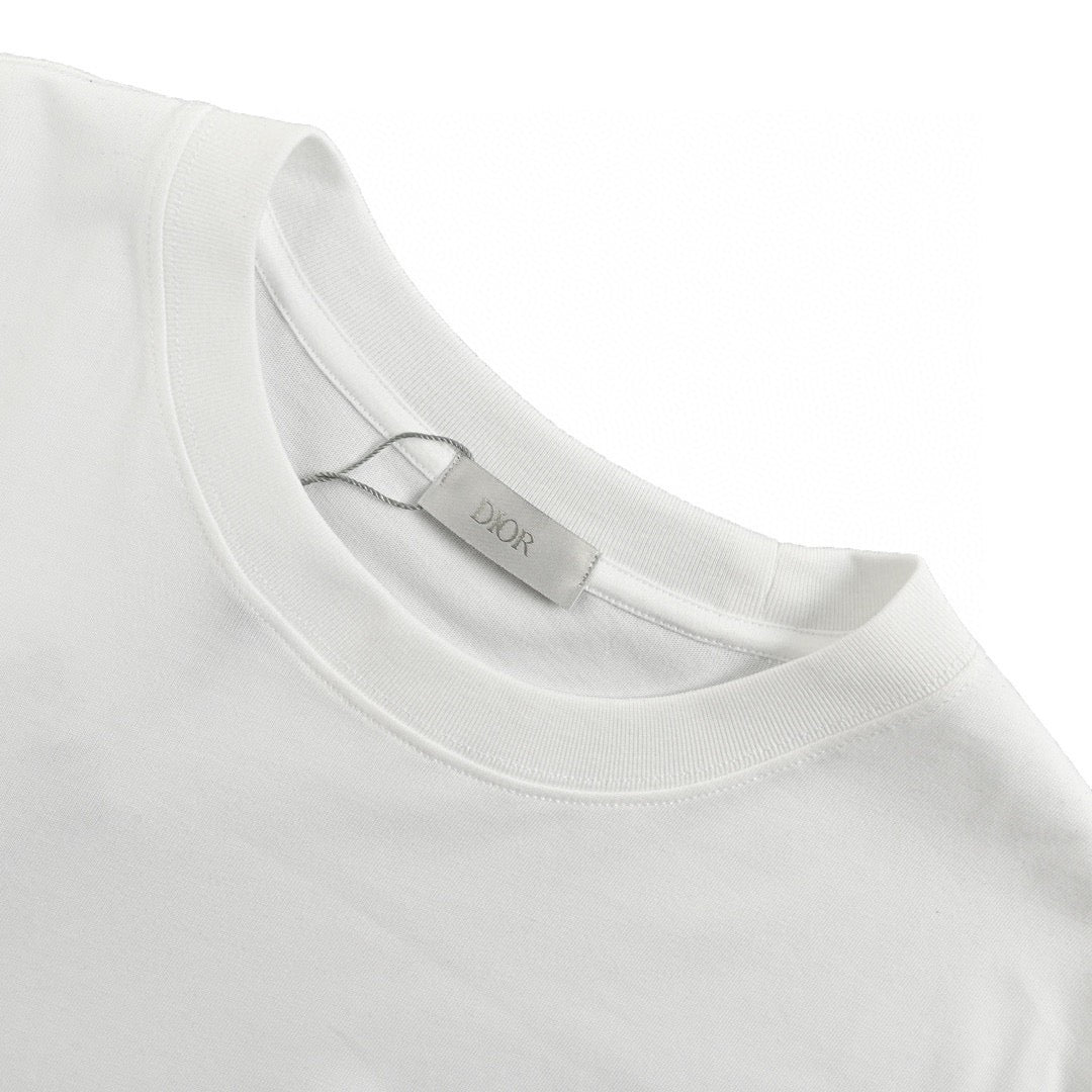 Dior Monster Graphic T-shirt - Green Unisex Streetwear Limited Edition - This Dior t-shirt features a playful green monster graphic intertwined with the brand name in