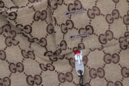 Gucci Monogram Track Jacket - Red Unisex Streetwear Limited Edition - This Gucci track jacket showcases the iconic Gucci monogram pattern in a classic brown color.