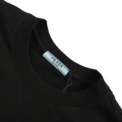 Prada T-shirt - Black Unisex Streetwear Limited Edition - This Prada t-shirt features a sleek black design. It has a small chest pocket with