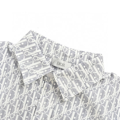 Dior Monogram Print Shirt (gray) Unisex Streetwear Limited Edition - This Dior shirt showcases an all-over monogram print in shades of gray and white, offering