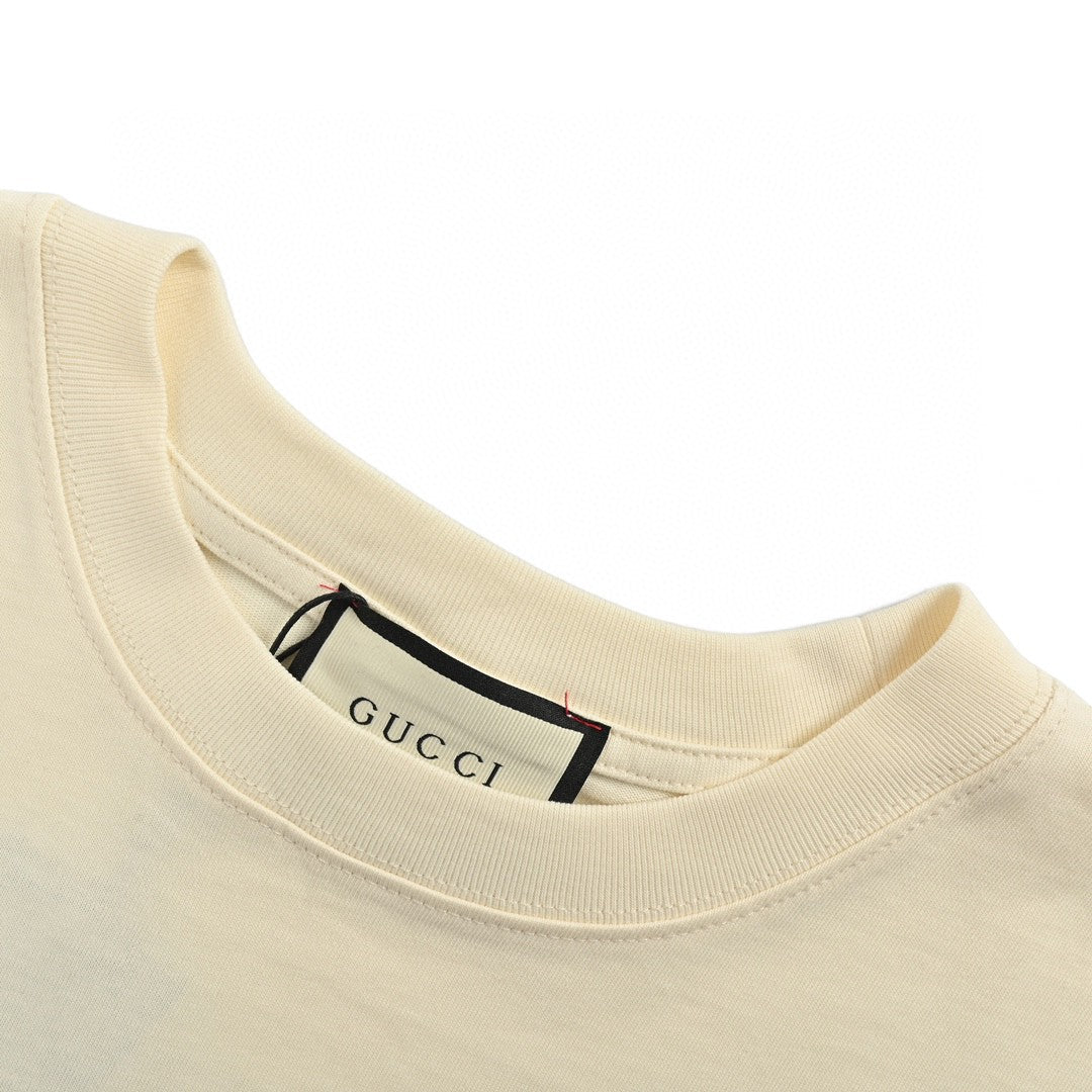 Gucci Vintage Logo T-shirt (cream) Unisex Streetwear Limited Edition - The Gucci Vintage Logo T-Shirt in cream brings a nostalgic touch to contemporary fashion. Crafted