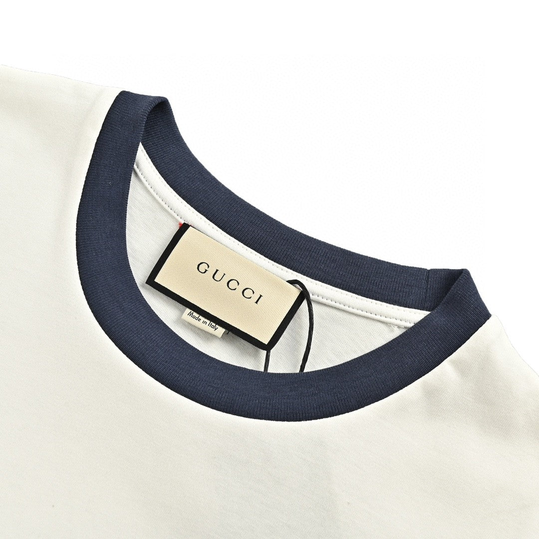Gucci Cherry Logo T-shirt - Black Unisex Streetwear Limited Edition - This Gucci t-shirt features a small, playful cherry graphic intertwined with the iconic Gucci logo