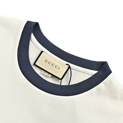 Gucci Cherry Logo T-shirt - Black Unisex Streetwear Limited Edition - This Gucci t-shirt features a small, playful cherry graphic intertwined with the iconic Gucci logo