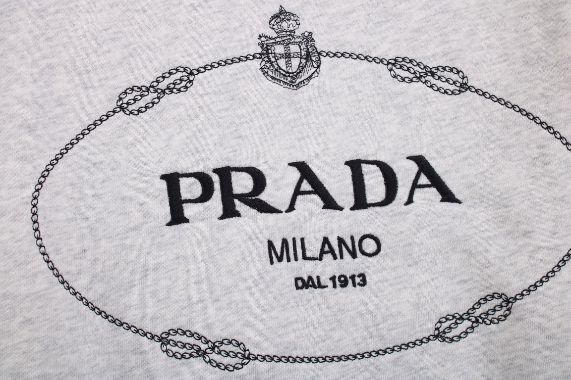 Prada Milano Hoodie - Grey Unisex Streetwear Limited Edition - This Prada Milano hoodie features a classic design with the iconic Prada logo on the
