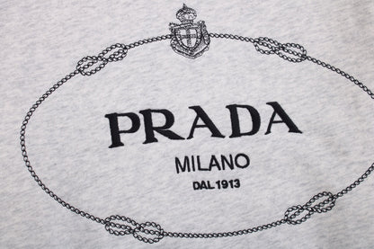 Prada Milano Hoodie - Grey Unisex Streetwear Limited Edition - This Prada Milano hoodie features a classic design with the iconic Prada logo on the