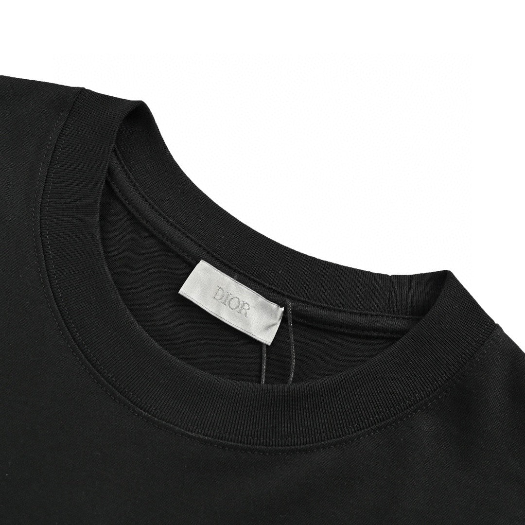 Dior Safety Pin Logo T-shirt - Black Unisex Streetwear Limited Edition - This Dior t-shirt features a unique design with the brand name and a stylized safety