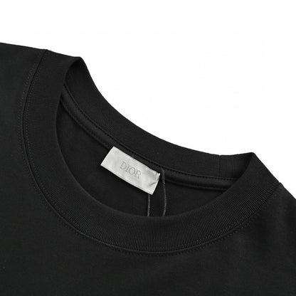 Dior Safety Pin Logo T-shirt - Black Unisex Streetwear Limited Edition - This Dior t-shirt features a unique design with the brand name and a stylized safety