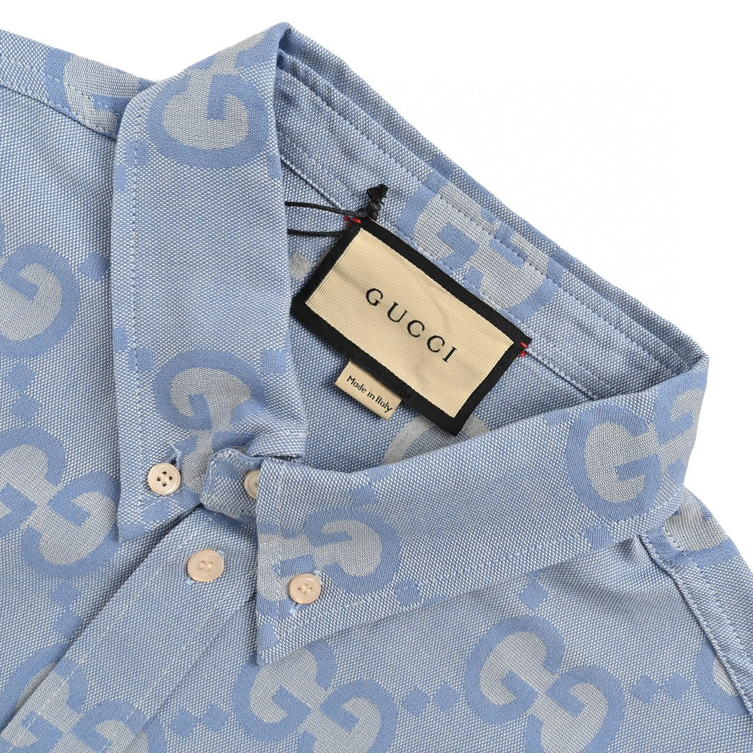 Gucci Allover Logo Denim Shirt - Blue Unisex Streetwear Limited Edition - This Gucci shirt features an allover GG logo design set against a light blue denim