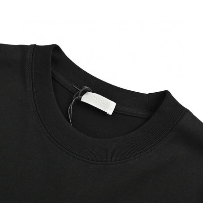 Dior Graffiti Logo T-shirt In - Black Unisex Streetwear Limited Edition - The Dior Graffiti Logo T-Shirt in black is a striking piece that combines the boldness