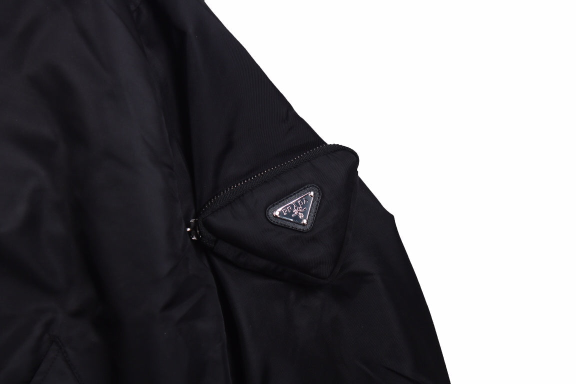 Prada Bomber Jacket - Black Unisex Streetwear Limited Edition - This Prada jacket features a classic black bomber design with a zip-up front. It has