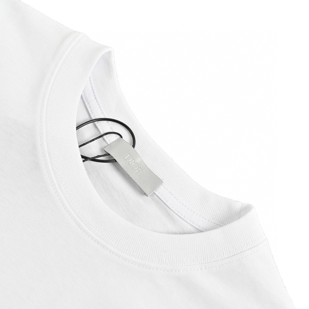 Dior Christian Dior Couture T-shirt - White Unisex Streetwear Limited Edition - This Dior t-shirt features a minimalist design with 'Christian Dior Couture' text in green on
