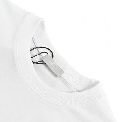 Dior Christian Dior Couture T-shirt - White Unisex Streetwear Limited Edition - This Dior t-shirt features a minimalist design with 'Christian Dior Couture' text in green on