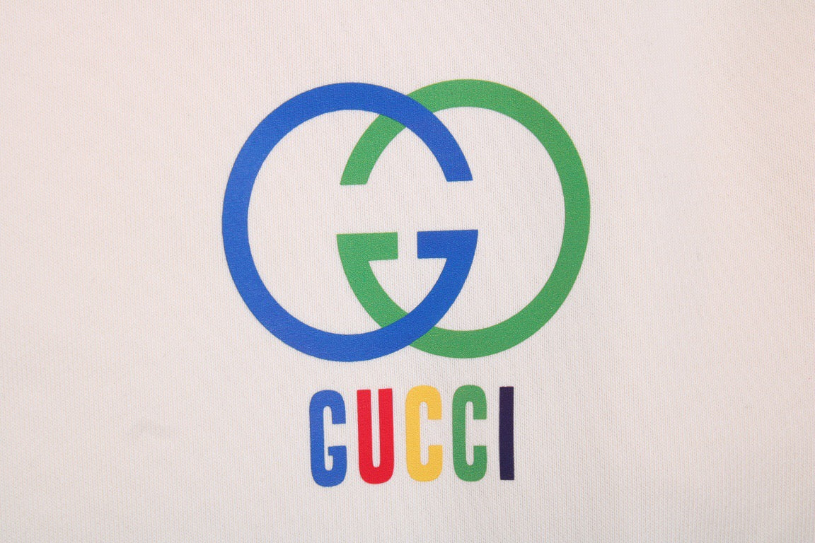Gucci Interlocking G Sweatshirt - - Cream Unisex Streetwear Limited Edition - This cream-colored Gucci sweatshirt showcases the iconic interlocking G logo in a striking blue and
