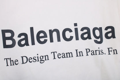 Balenciaga Paris Team Hoodie - White Unisex Streetwear Limited Edition - This Balenciaga hoodie in white features the text 'Balenciaga The Design Team In Paris. Fn'