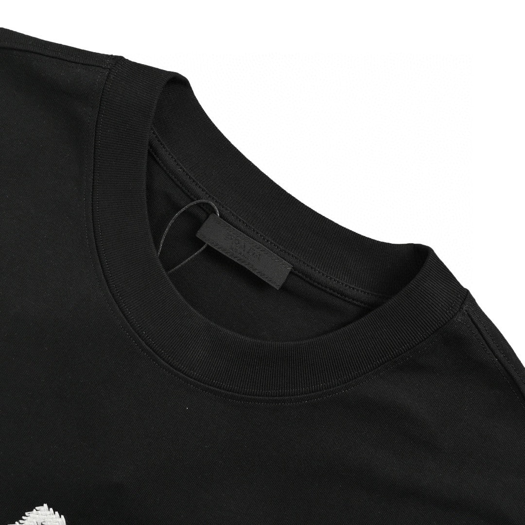 Prada Milano Black Emblem T-Shirt - close up - replica sneakers