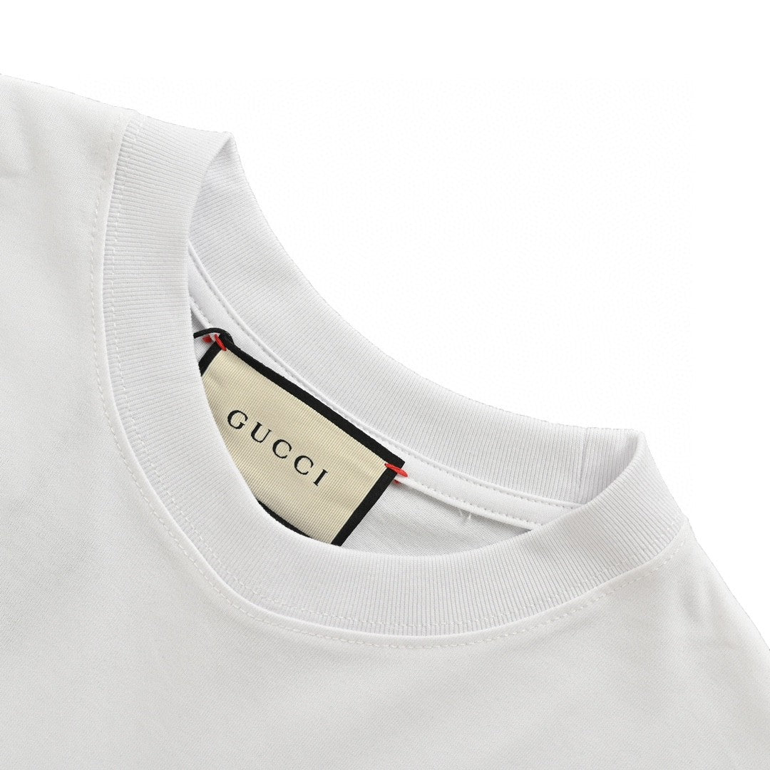 Gucci Gg Blue Stripe T-shirt - White Unisex Streetwear Limited Edition - This Gucci t-shirt features a stylish blue stripe design across the chest and sleeves, accented