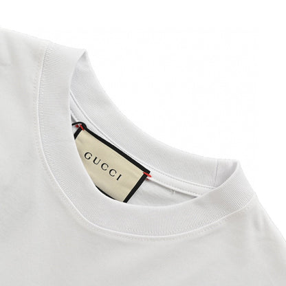 Gucci Gg Blue Stripe T-shirt - White Unisex Streetwear Limited Edition - This Gucci t-shirt features a stylish blue stripe design across the chest and sleeves, accented