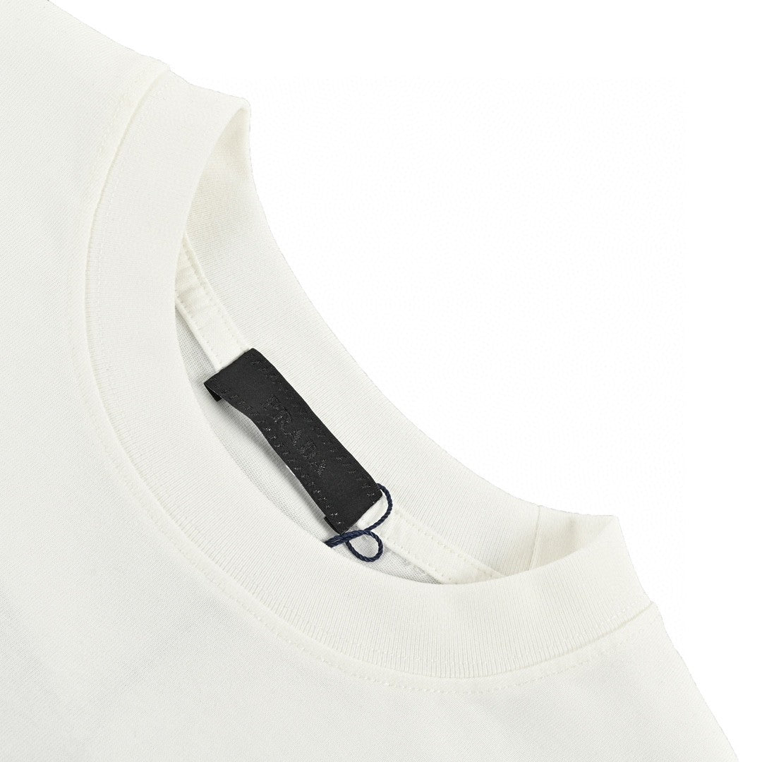 Prada Pocket T-shirt Unisex Streetwear Limited Edition - This Prada t-shirt features a distinctive chest pocket with the Prada logo. Made from premium