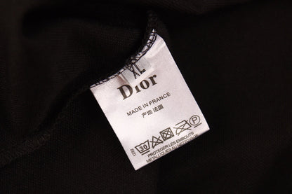 Polo Dior con diseño de logotipo floral