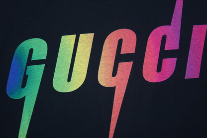 Gucci Rainbow Lightning T-shirt (black) Unisex Streetwear Limited Edition - <span>Vibrant black t-shirt featuring a bold, rainbow-colored Gucci logo with lightning bolt accents. Crafted from