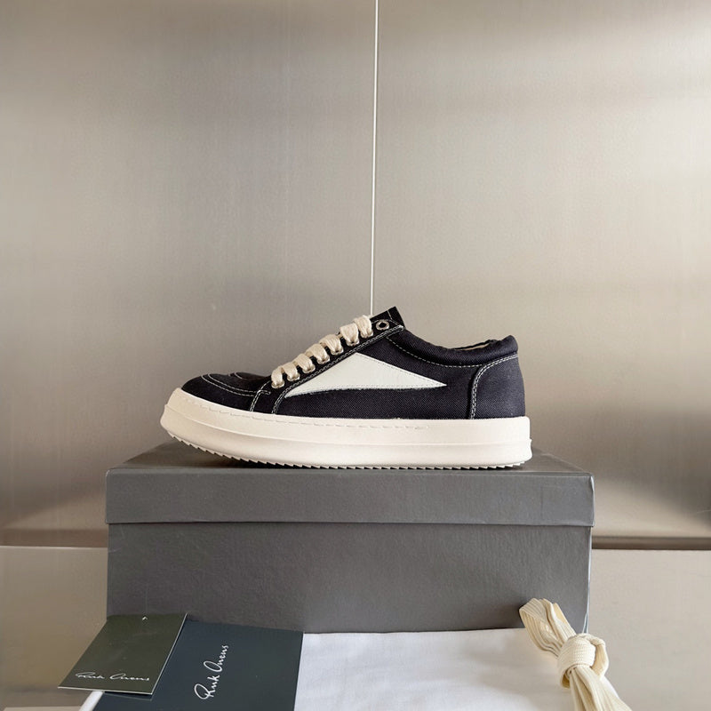 Rick Owens Canvas Low-top Sneakers - Black Unisex Streetwear Limited Edition - **Rick Owens Black Canvas Low-Top Sneakers: Modern Minimalism and Superior Craftsmanship** Introducing the Rick Owens