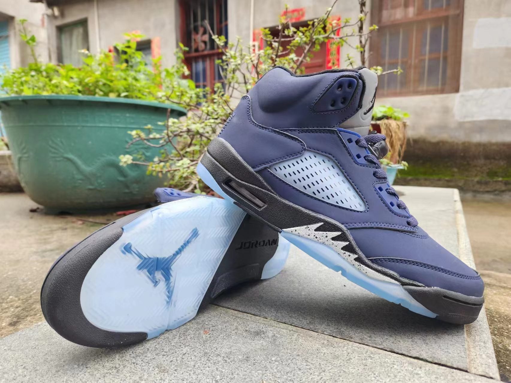 Jordan 5 Blue And - Black Unisex Streetwear Limited Edition - Elevate your sneaker collection with the Air Jordan 5 in a sleek navy blue and