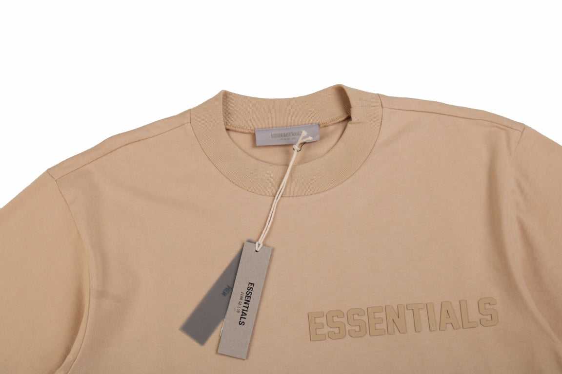 Fear Of God Essentials T-shirt - Beige Unisex Streetwear Limited Edition - <p dir='ltr'><span>This Fear of God Essentials t-shirt features a simple, minimalist design in a