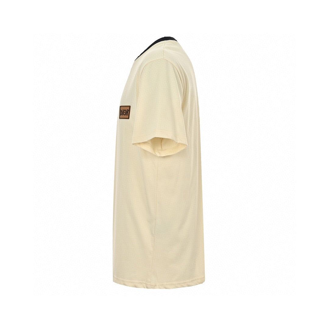 Camiseta Dior color crema con ribete negro