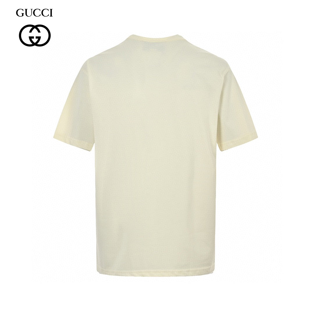 Gucci Graphic T-shirt - Cream Unisex Streetwear Limited Edition - <span>This Gucci t-shirt features a striking graphic design with the Gucci logo displayed in a