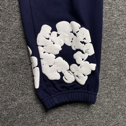 PANTALONES DEPORTIVOS DENIM TEARS CON CORONA DE ALGODÓN AZUL MARINO