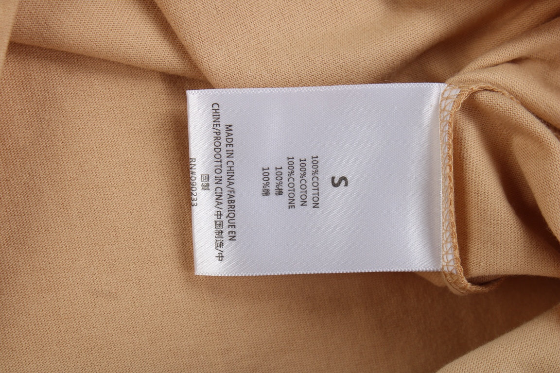 Fear Of God Essentials T-shirt - Beige Unisex Streetwear Limited Edition - <p dir='ltr'><span>This Fear of God Essentials t-shirt features a simple, minimalist design in a