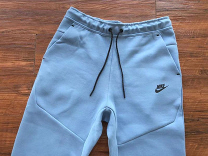 NIKE Tech Fleece Pants - Light - Blue Unisex Streetwear Limited Edition - The NIKE TECH FLEECE PANTS LIGHT BLUE - REPLICA blend modern athletic performance with sleek