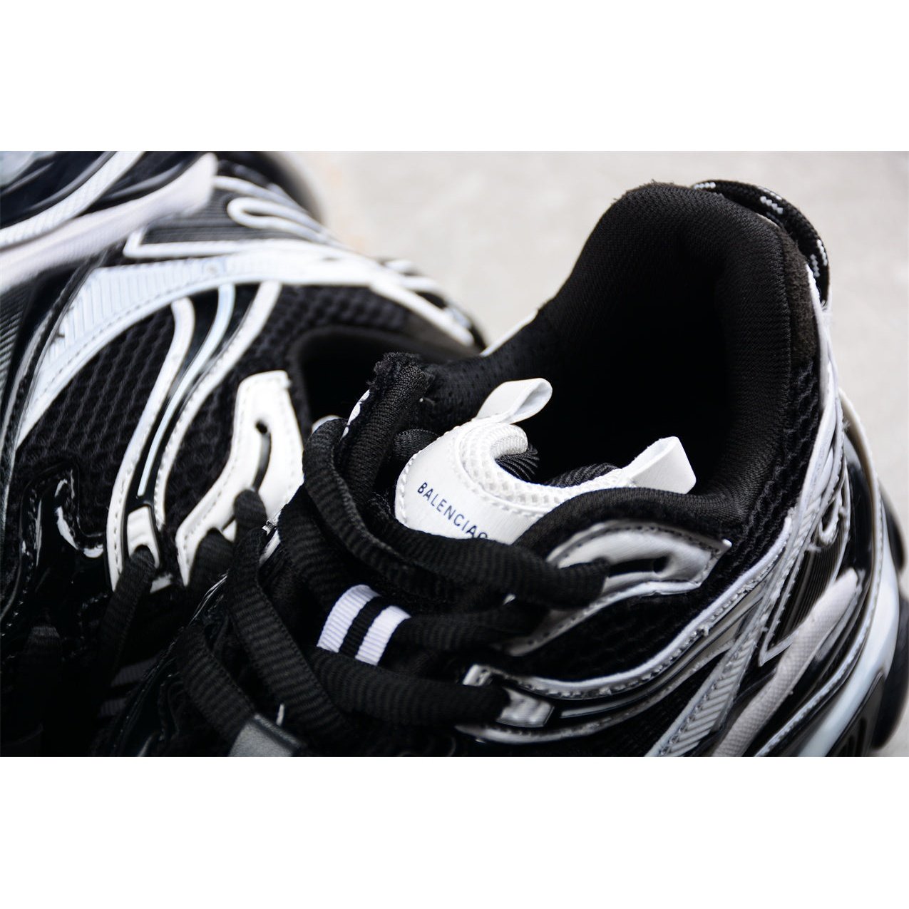 BALENCIAGA Runner - White Sneakers - Black Unisex Streetwear Limited Edition - The BALENCIAGA Runner x Black White sneakers exude a sleek and timeless elegance, perfect for