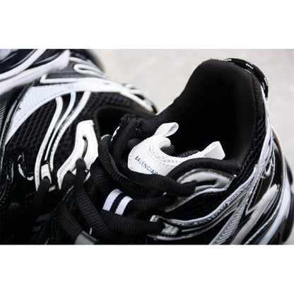 BALENCIAGA Runner - White Sneakers - Black Unisex Streetwear Limited Edition - The BALENCIAGA Runner x Black White sneakers exude a sleek and timeless elegance, perfect for