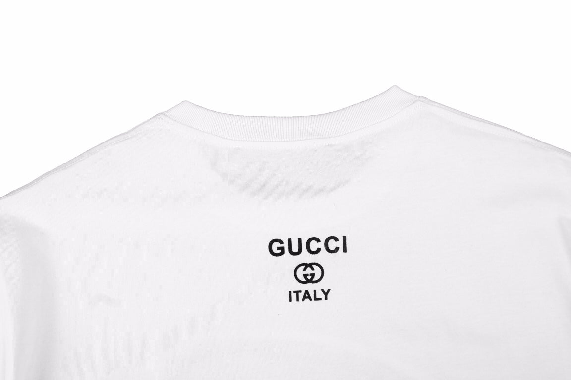 Camiseta gráfica con gafas de sol Gucci