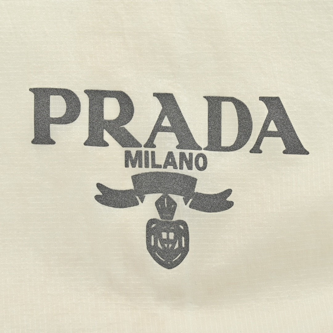 Prada Lightweight Hooded Jacket - White Unisex Streetwear Limited Edition - This Prada jacket features a translucent white design with the Prada logo on the chest.