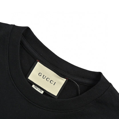Camiseta Gucci con logo salpicado (negra)