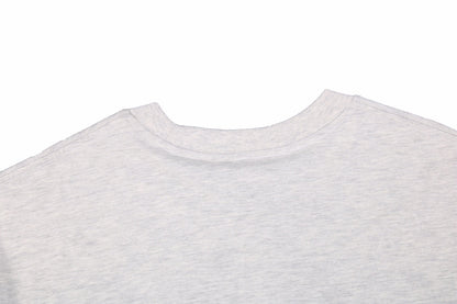 Camiseta con el logo de Fear of God Essentials - Gris jaspeado