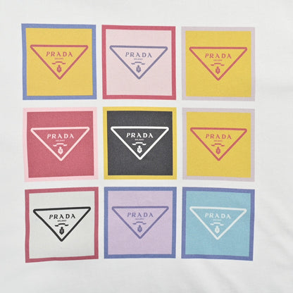 Prada Pop Art Logo T-shirt - White Unisex Streetwear Limited Edition - The Prada Pop Art Logo T-Shirt features a playful and colorful design that captures the