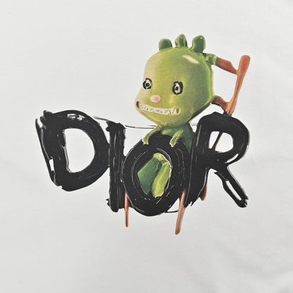 Dior Monster Graphic T-shirt - Green Unisex Streetwear Limited Edition - This Dior t-shirt features a playful green monster graphic intertwined with the brand name in