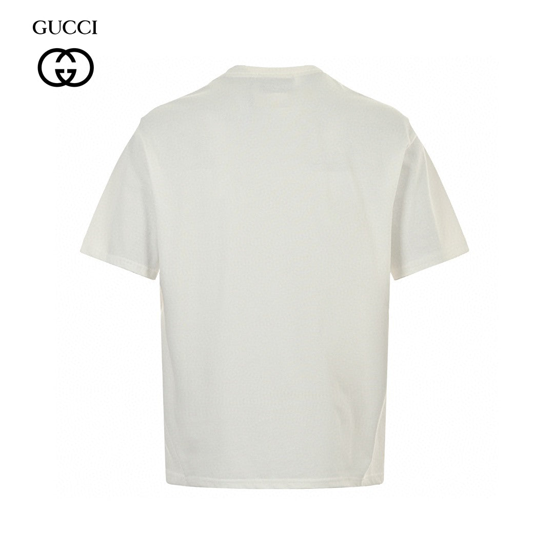Gucci T-shirt - Scribble Logo - White Unisex Streetwear Limited Edition - <span>This Gucci t-shirt features a distinctive design with the iconic Gucci logo in a scribble