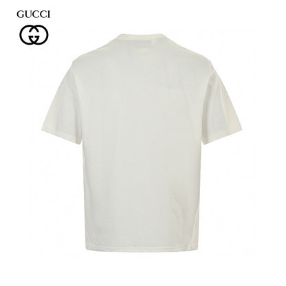 Gucci T-shirt - Scribble Logo - White Unisex Streetwear Limited Edition - <span>This Gucci t-shirt features a distinctive design with the iconic Gucci logo in a scribble