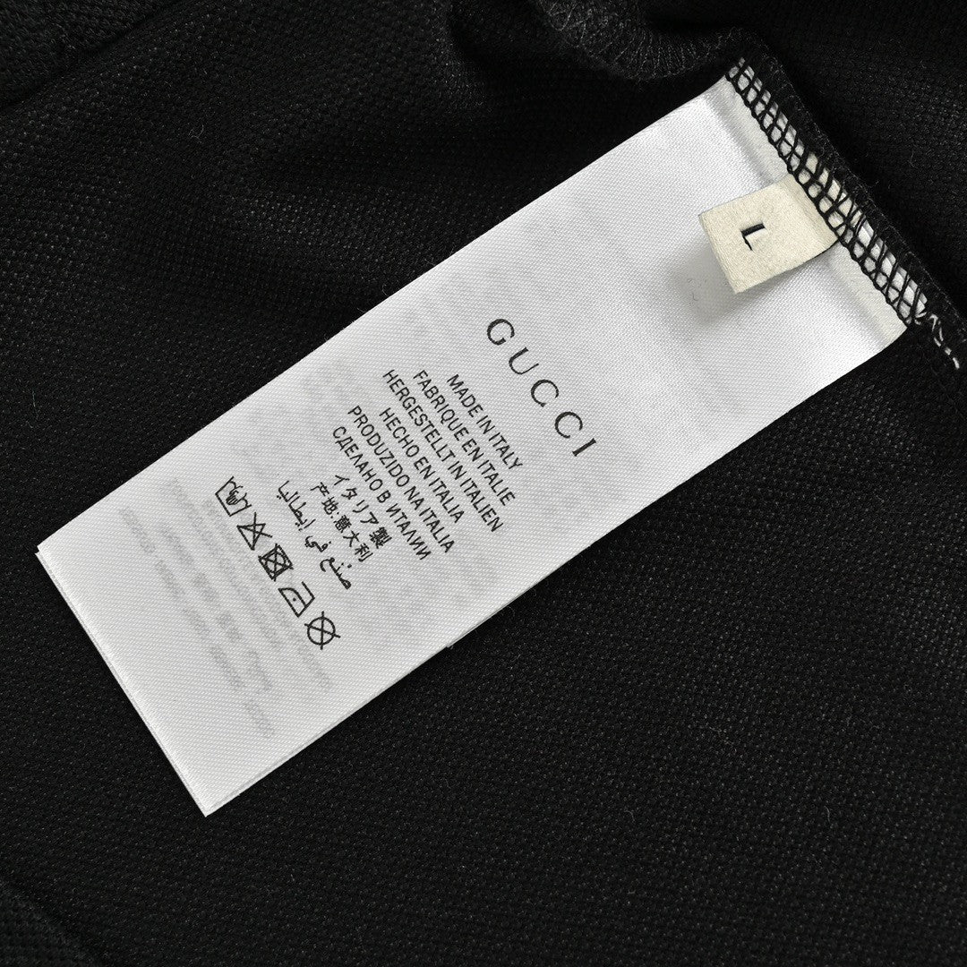Gucci Flame Logo Polo Shirt - Black Unisex Streetwear Limited Edition - <span>This Gucci polo shirt features a sleek black design with distinctive elements. It includes a