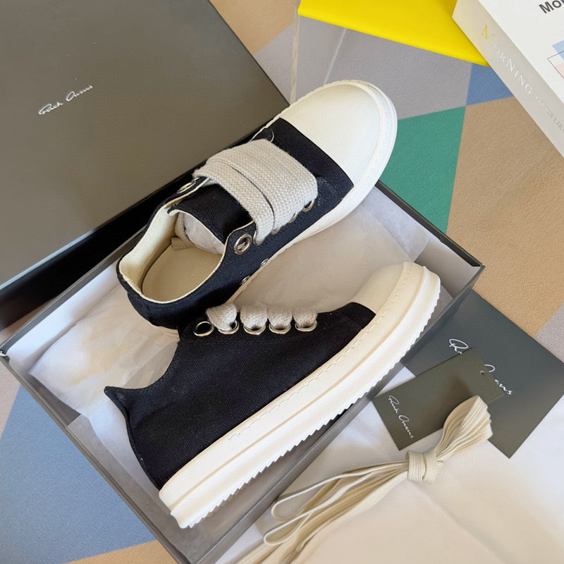 Rick Owens Canvas Low-top Sneakers - Black Unisex Streetwear Limited Edition - **Rick Owens Black Canvas Low-Top Sneakers: Modern Minimalism with Superior Craftsmanship** Introducing the Rick Owens