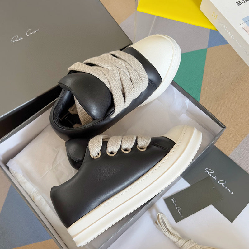 Rick Owens And White Low-top Sneakers - Black Unisex Streetwear Limited Edition - **Rick Owens Black and White Low-Top Sneakers: Modern Elegance and Superior Craftsmanship** Introducing the Rick