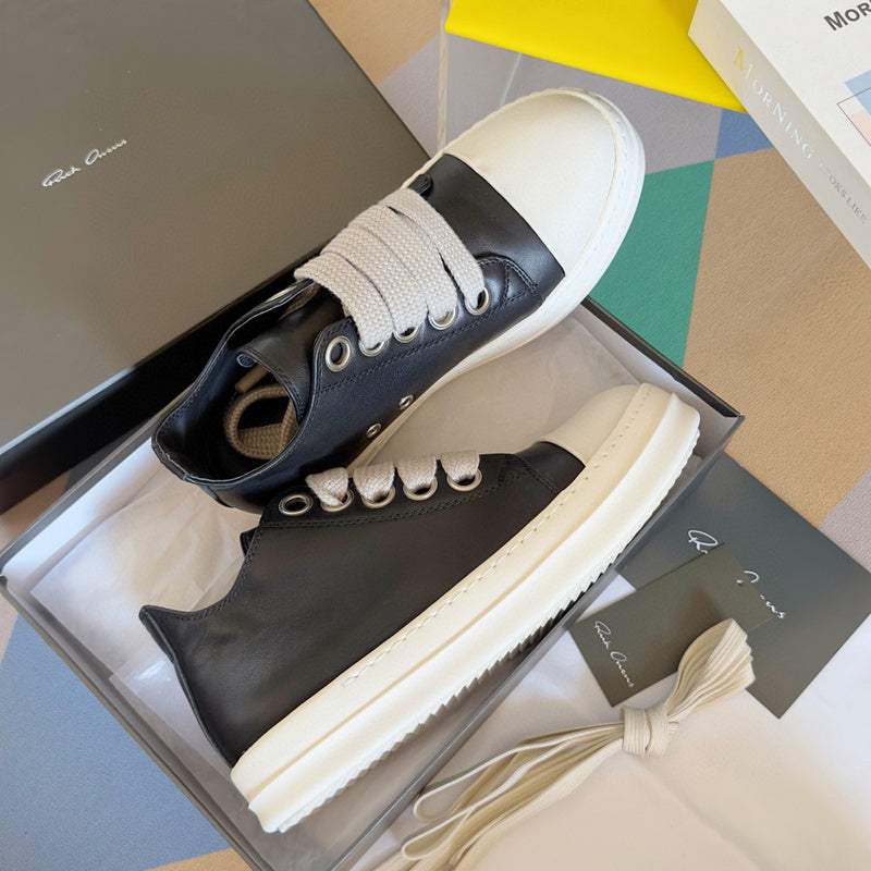 Rick Owens Low-top Sneakers - Black Unisex Streetwear Limited Edition - **Rick Owens Black Low-Top Sneakers: Modern Elegance and Superior Craftsmanship** Introducing the Rick Owens Black