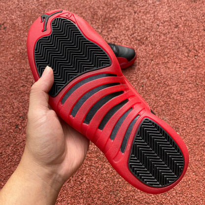 Jordan 12 Flu Game - Black Unisex Streetwear Limited Edition - Introducing the Air Jordan 12 Retro in a striking black and red colorway, a timeless